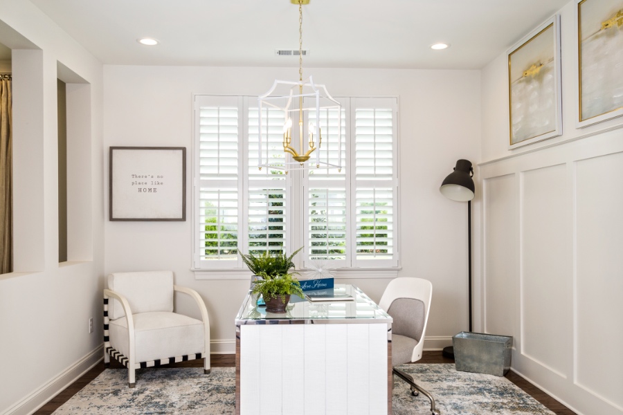 Office with white polywood shutters