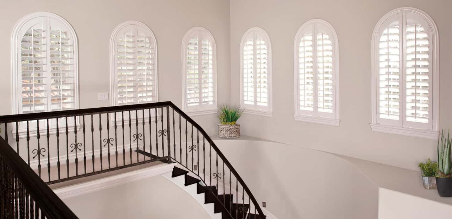 Custom-fitted window treatments perfectly cover your window and hang perfectly. Arched Plantation Shutters