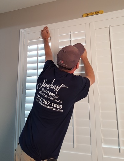 Shutter installation in Sacramento bedroom.