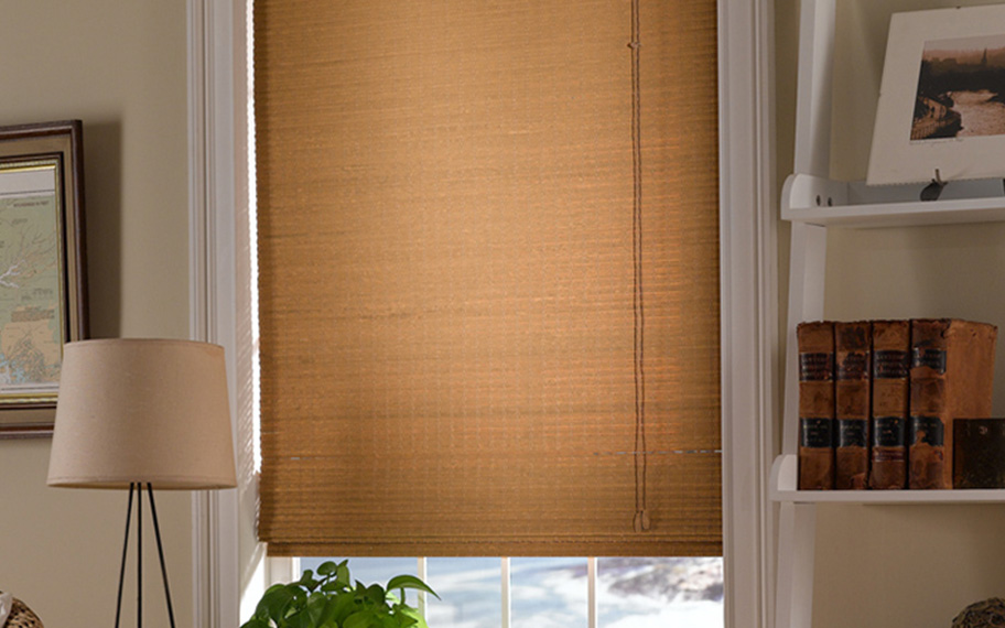 Tan woven fiber shades in a living room