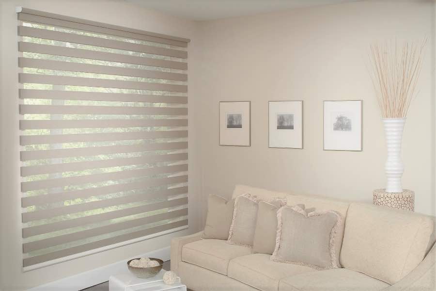 Zebra shades give you a unique combination of light control and style that benefits your Sacramento home. Zebra shade allows filtered light into a living room