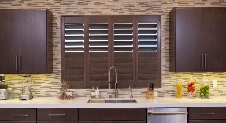 Divider rail shutters in a Sacramento kitchen. Sacramento cafe kitchen shutters