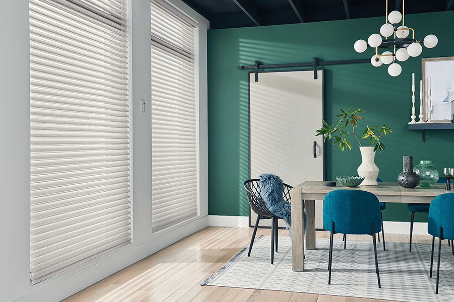 Versatile sheer shades let you decide how much of a view you want while enjoying your Sacramento dining room. White sheer shades on windows in a green dining room