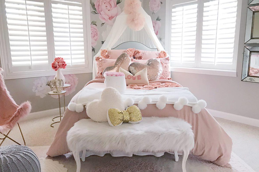 Polywood shutters have high-quality finishes and are also fume-free. Photo credit: @nanlindy White polywood shutters in a little girl's bedroom