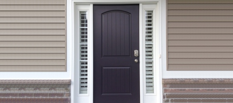 Entry Door Sidelight Shutters In Sacramento, CA Entry Door Sidelight Shutters Next To Black Door In Sacramento, CA